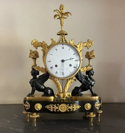 Réparation horloge cartel dorée Réparation horloge cartel dorée